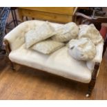 An early 20th century walnut sofa, a corner chair, a wash stand, a stool, a child's chair and a