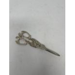 A pair of Victorian silver grape scissors, with figural handles, London 1885, 3 ozt