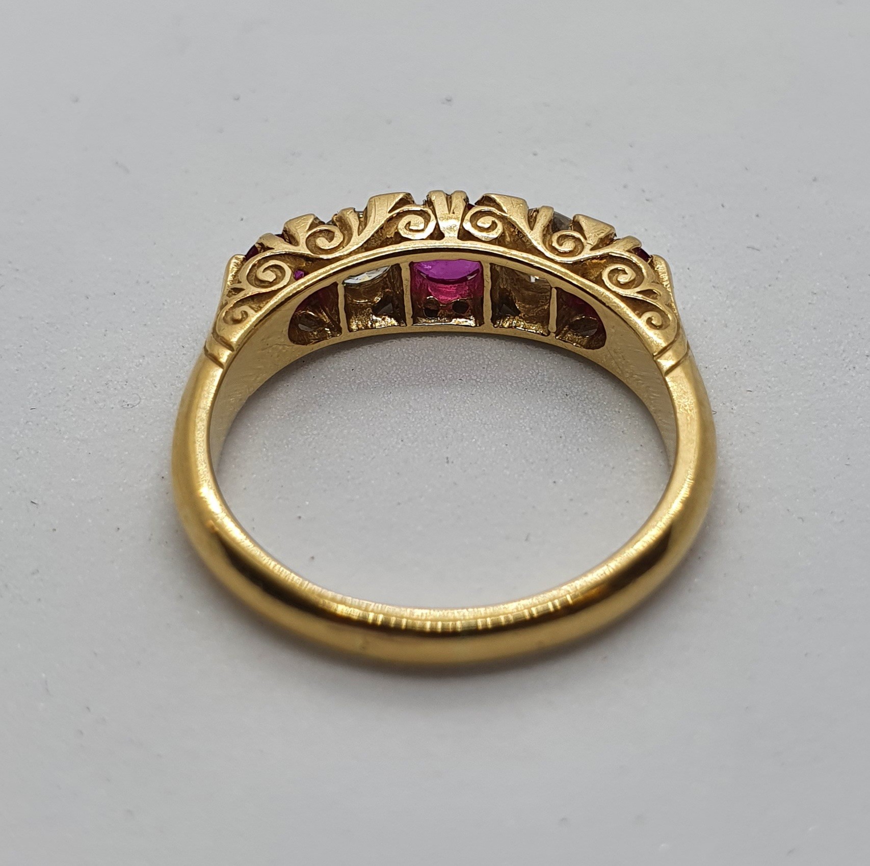 An 18ct gold, diamond and ruby five stone ring, ring size P 1/2 5.8 g all in overall condition - Image 4 of 4