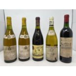 A bottle of Chateau Lyonnait Lussac Saint-Emillion, 1986, a bottle of Chateauneuf du Pape, 1986