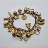 A 9ct gold charm bracelet, with assorted charms, 47.6 g (all in)