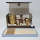 A 20th century barograph, in perspex case, an early 20th century table top lathe, Paul Christen, and