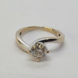 An 18ct gold solitaire diamond ring, ring size E 1/2