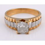 An 18ct yellow and white gold solitaire diamond gentleman's ring, ring size Z