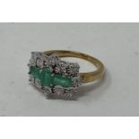 A 9ct gold, emerald and diamond ring