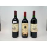 Two bottles of Chateau Haut Grand Faurie St Emillion, 1990, Robert Parker 98/100, and a bottle of
