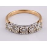 An 18ct gold five stone diamond ring, ring size L Diamond weight 1.43ct approx. with gemological