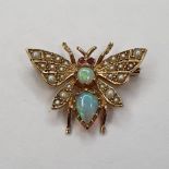 A 9ct gold seed pearl and opal butterfly brooch