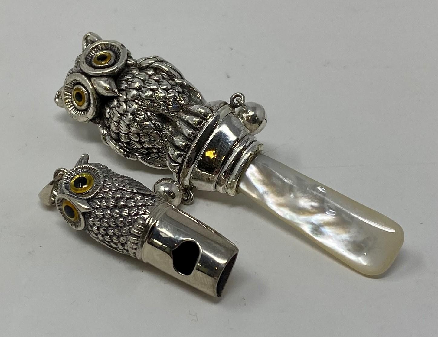 A silver owl rattle, with a mother of pearl bite and an owl whistle (2) This is a modern copy