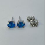 A pair of neon apatite stud earrings