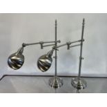 A pair of chrome adjustable table lamps, by Andrew Martin (2) The wire has been cut off and will