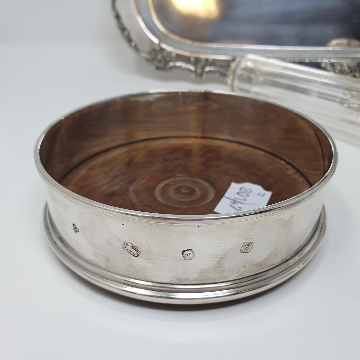 A pair of silver bottle coasters, with turned wooden bases, London 1981, 12.5 cm diameter, set of - Image 5 of 8