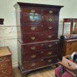 A 19th century mahogany chest on chest, the top having two short and three long drawers, on a base