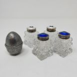 A pair of Continental cut glass inkwells, with silver coloured metal and blue enamel tops, another