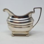 A George V silver milk jug, London 1935, 6 ozt