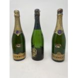Two bottles of Pommery champagne, 1982, and a bottle of Bollinger champagne, 1973 (extremely low
