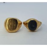 A 9ct gold signet ring, and another inset with black stone, 15 g (all in) (2) Signet ring cut, black