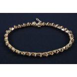 A 14ct gold and diamond set bracelet