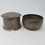 An Indian silver coloured metal box, decorated with animals, 11 cm diameter, and a bowl, 10.5 cm