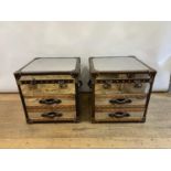 A pair of chrome and leather bedside chests, by Andrew Martin, 59 cm wide