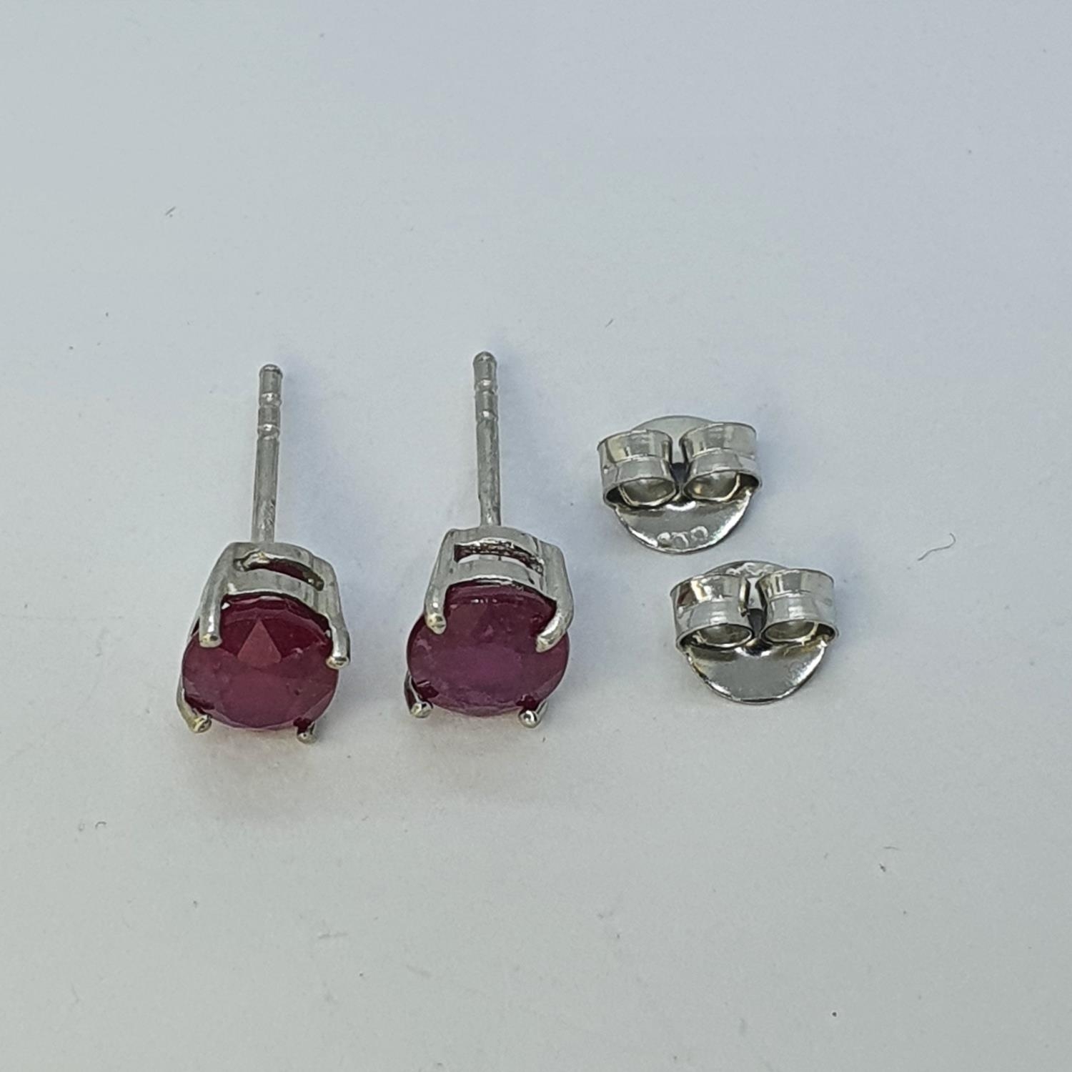 A pair of ruby stud earrings Treated rubies - Image 2 of 2