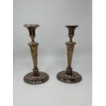 A pair of silver plated candlesticks, on oval bases and various other silver plate (box)