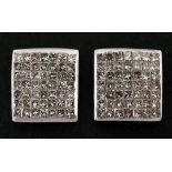 A pair of white gold and diamond square stud earrings