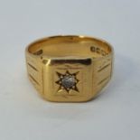 An 18ct gold and diamond signet ring, ring size P, 9.4 g