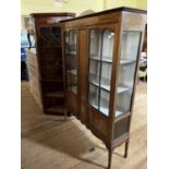 An early 20th century mahogany display cabinet, 123 cm wide, a corner cabinet and a brass fan form