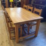 A Laura Ashley oak dining table and six matching chairs 181 x 91 cm overall condition good with