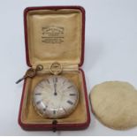 A yellow coloured metal open face pocket watch, with the silvered dial with Roman numerals, 5 cm