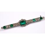 A late 19th/early 20th century emerald and diamond bar brooch