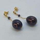 A pair of gold and maroon coloured fresh water pearl drop earrings