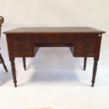 A walnut kneehole desk, 107 cm wide and an oak chair (2)