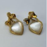 A pair of gold, diamond and mother of pearl heart shape drop earrings