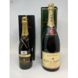 A magnum of Moet & Chandon Brut Imperial NV champagne, and a bottle of Moet & Chandon vintage