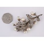 A large late Victorian gold, diamond and pearl (not tested) leaf brooch, 8 cm