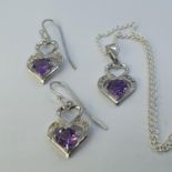 A pair of silver, amethyst and diamond set earrings, and a matching necklace (2) This is a modern