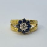 A 9ct gold, sapphire and diamond cluster ring, ring size M 6.2g all in weight