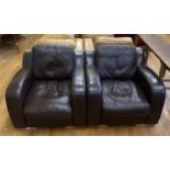 A pair of brown leather armchairs (2)