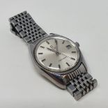 A gentleman's stainless steel Omega Seamaster wristwatch On an Omega strap, see images
