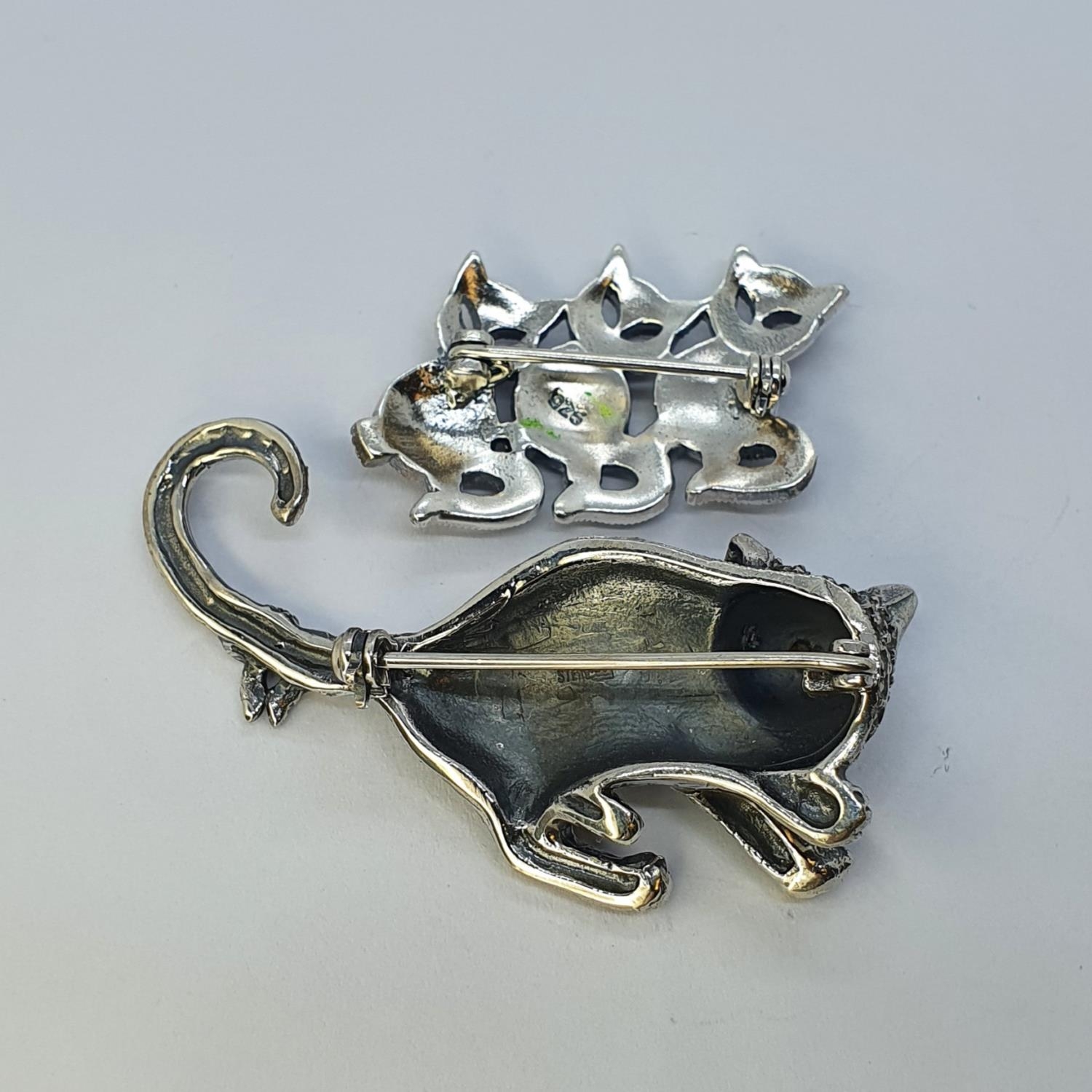 A silver and marcasite cat brooch, and another (2) This is a modern copy - Image 2 of 2