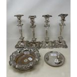 A set of four silver plated candlesticks, a bottle coaster and a card tray (6)