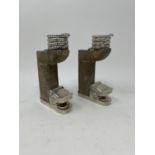 A pair of Mexican silver and carved stone candlesticks, in the form of dragons, 15 cm high (2)