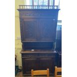 A French buffet, the top with two cupboard doors, above an open section, on a base with two