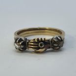 A 19th century Fede Gimmel three section ring with hand clasped section, ring size O 1/2