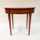 An oval table, veneered in satinwood and crossbanded in rosewood, on square tapering legs, 83 cm