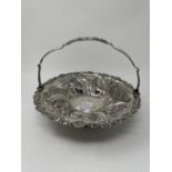 A William IV silver cake basket, London 1836, 19.6 ozt, diameter 27 cm