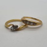 An 18ct gold five stone diamond ring, ring size M and a 9ct diamond ring, ring size N (2) all in