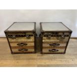 A pair of chrome and leather bedside chests, by Andrew Martin, 59 cm wide